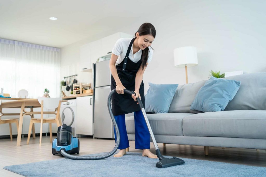 asian-cleaning-service-woman-worker-cleaning-in-living-room-at-home